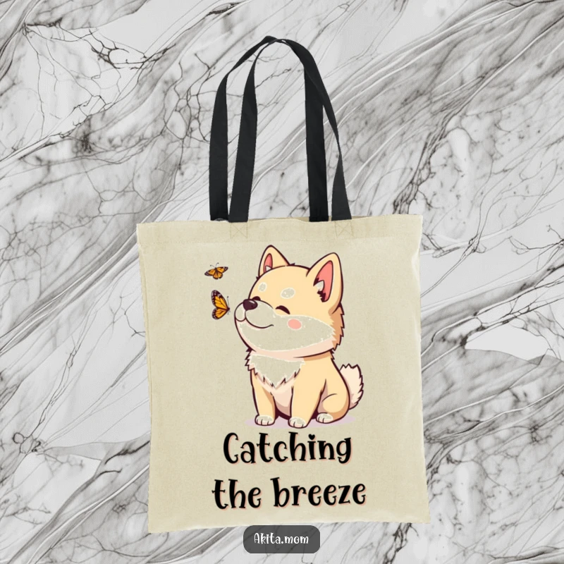 Funny Kawaii Akita tote bag with a playful head tilt, observing a fluttering butterfly, symbolizing curiosity and the beauty of nature.