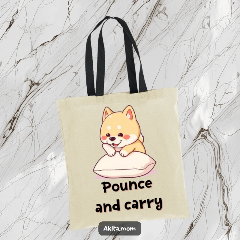 Funny Kawaii Akita tote bag displays a cute dog leaping playfully onto a soft cushion, ideal for fashionable pet owners.